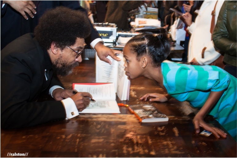 dr. cornel west meets a fan at his book signing